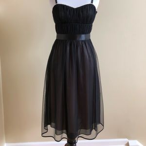 Strapped dress by Phoebe Couture